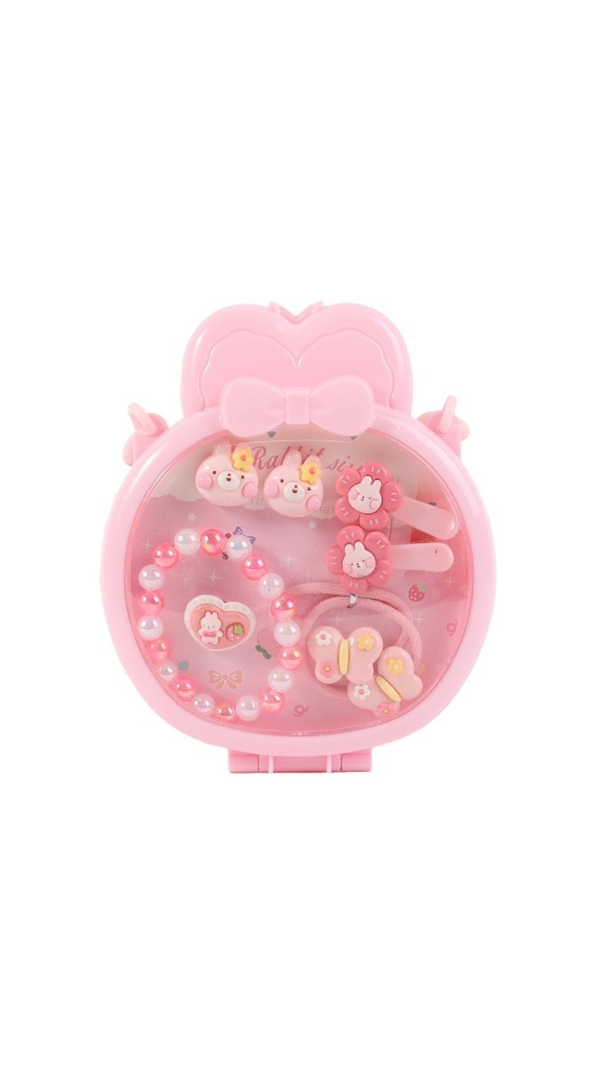 Pink heart-shaped jewelry case with pearl bracelet, hair clips, charm beads