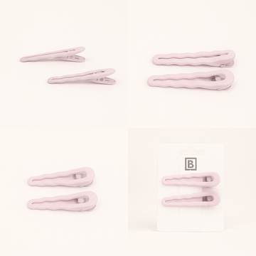 Light pink curved hair clips with interlocking teeth detail