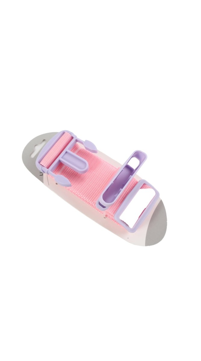 Pink luggage strap end with gray and rose plastic buckle, stitched loops visible.