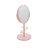 Pink oval tabletop mirror on pedestal with crossbar jewelry stand