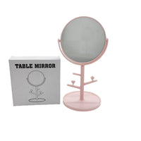 Pink tabletop mirror with jewelry stand bar and small hooks on base