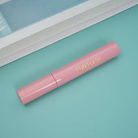 Pinkflash mascara tube in dusty pink with gold-toned brand lettering