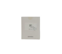 Plum tea scented candle box with front label and minimalist branding