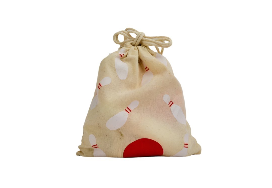 Drawstring pouch with bowling-pin print for mini wooden bowling set.