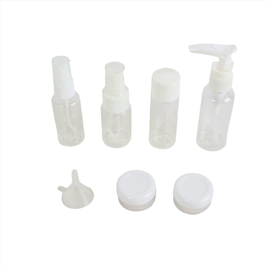 Travel bottle kit with clear squeeze bottles, pump dispenser, and screw caps.