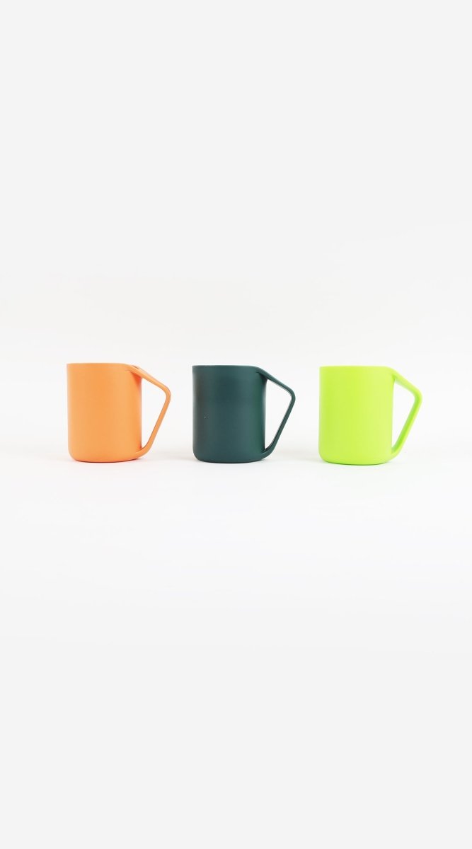 Three plastic cups: orange, dark green, light green, each with handle