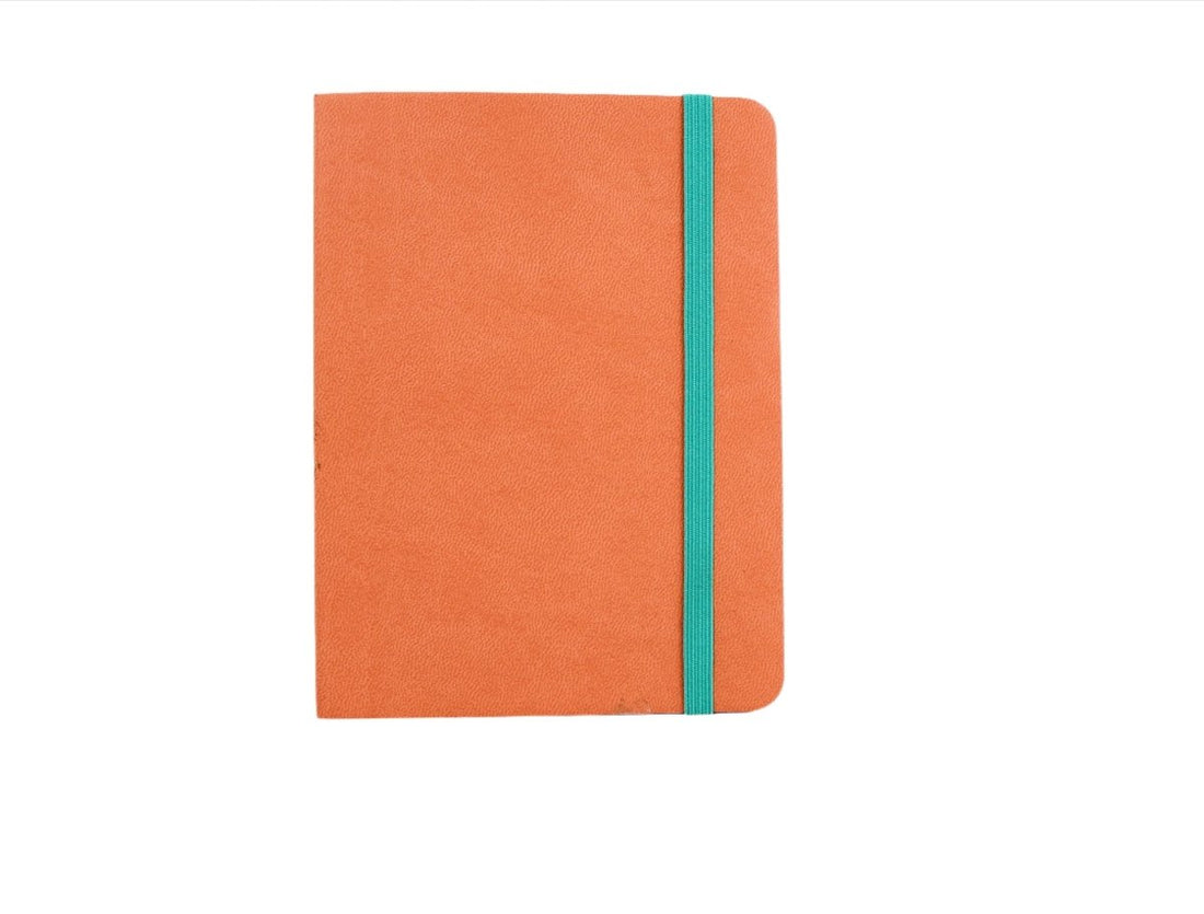 Orange notebook with teal elastic strap, hardcover journal.