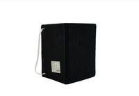 Black compact notebook with ribbon bookmark and stitched binding