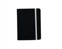 Black compact notebook with light gray vertical elastic band