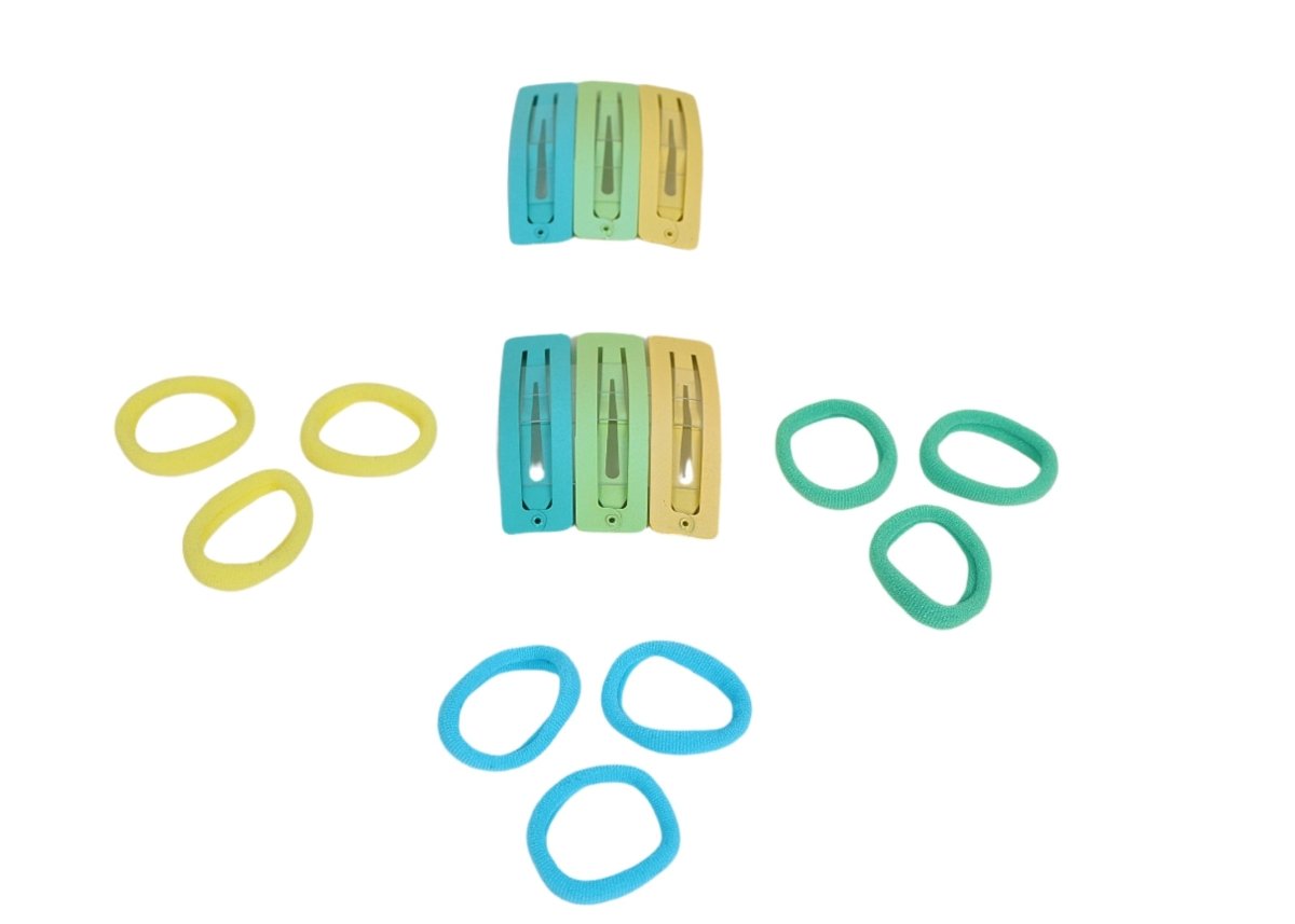 Colorful kids hair clips in yellow, light blue, and teal, shown without packaging
