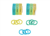 Kids hair clips in yellow, green, blue, and teal tones, shown as separate pairs