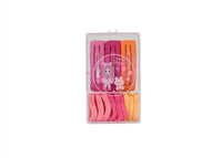 Kids hair clips set with pink and orange tones, clear hanging package