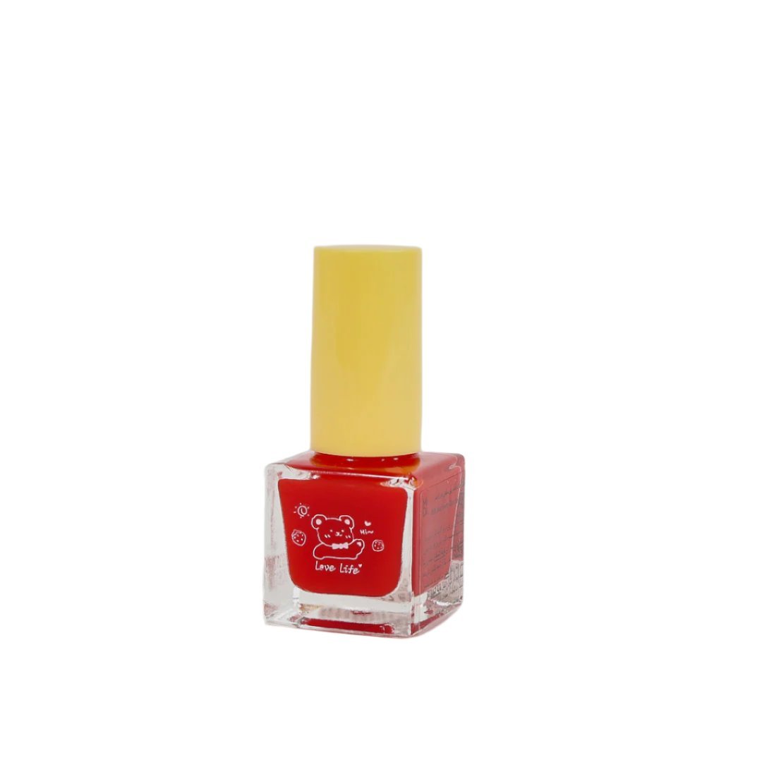 Red nail polish bottle with cute bear label, yellow cap on top