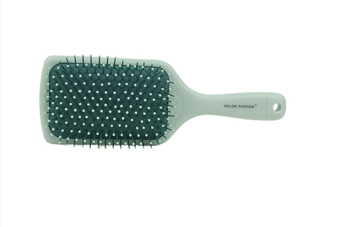 Green square paddle hair brush with scalp massage pins and molded grip handle