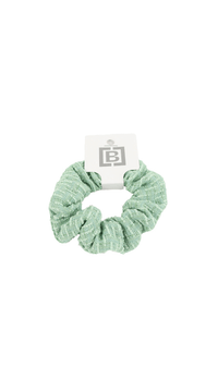 Woven hair scrunchie in mint green, gathered knit texture