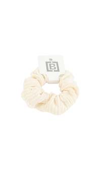 Woven hair scrunchie in cream beige, gathered knit texture
