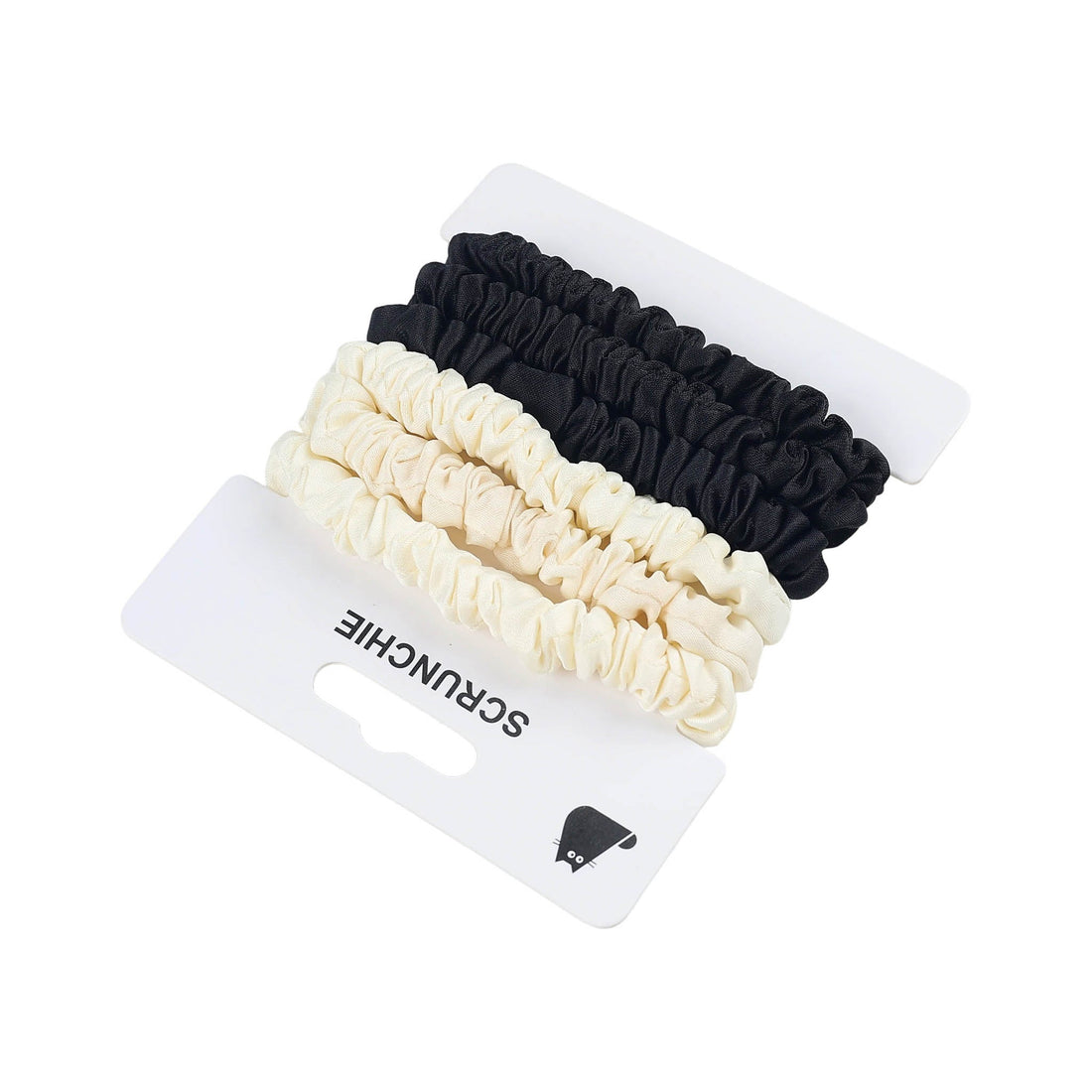 Scrunchie hair tie set on card showing cream and black ruffled bands, side view