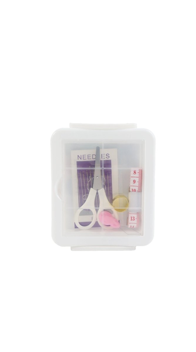 Sewing kit storage box with sewing tools: scissors, needle pack, thread, and tape measure