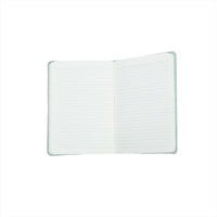Open cloth-covered lined notebook with ruled pages and mint edges