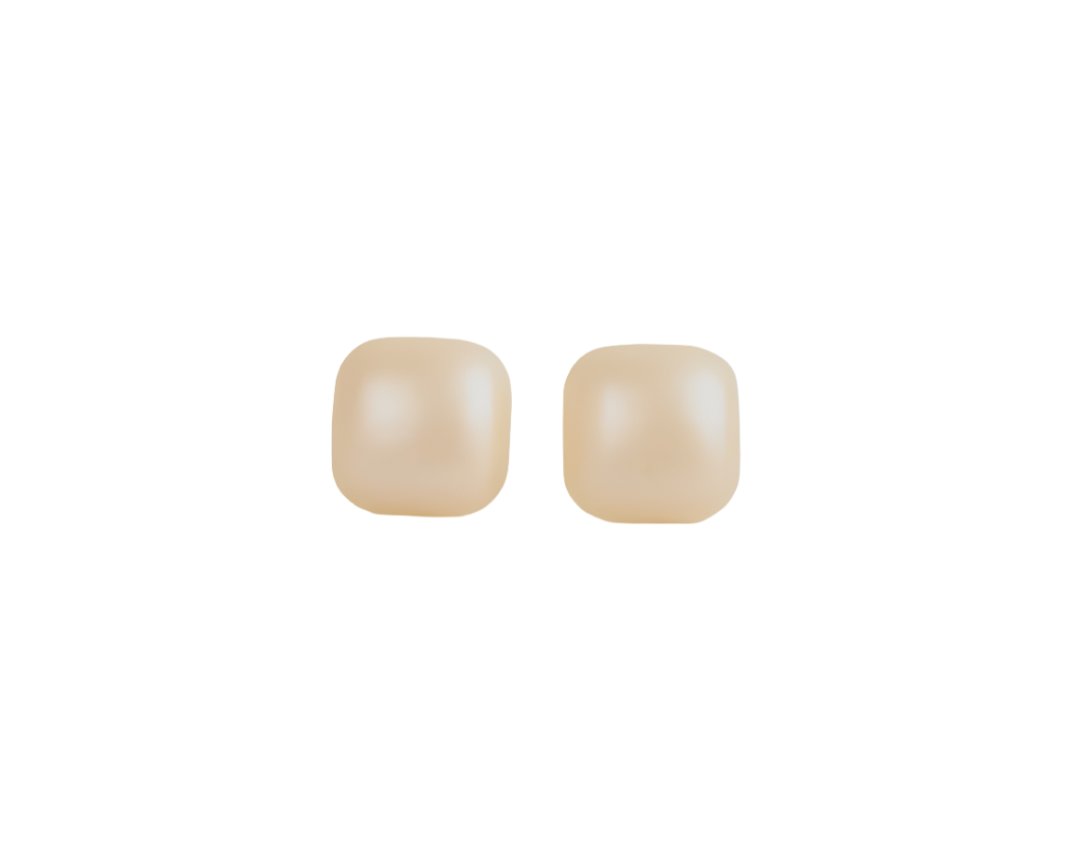 Glossy cream square stud earrings, front view