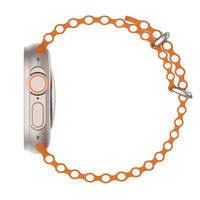 Orange perforated watch band with silver case side buttons