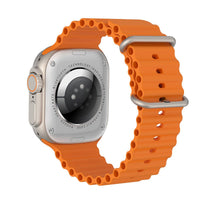 Smartwatch with orange perforated strap and silver case, back sensor area visible