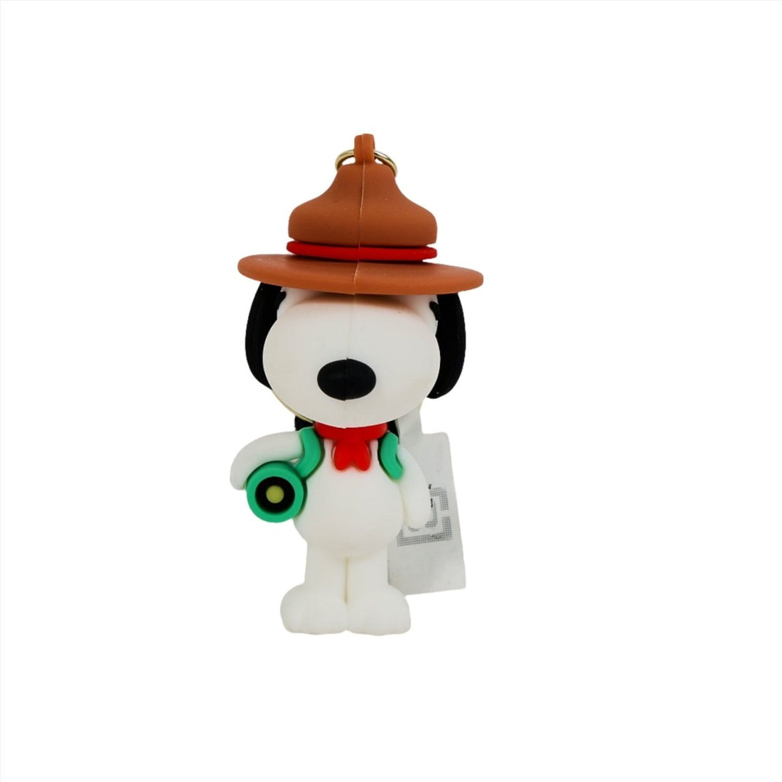 Snoopy PVC keychain of white dog in orange hat with green accessory and clip