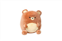 Plush bear with red-brown fur, cream belly patch, button eyes, and raised ears