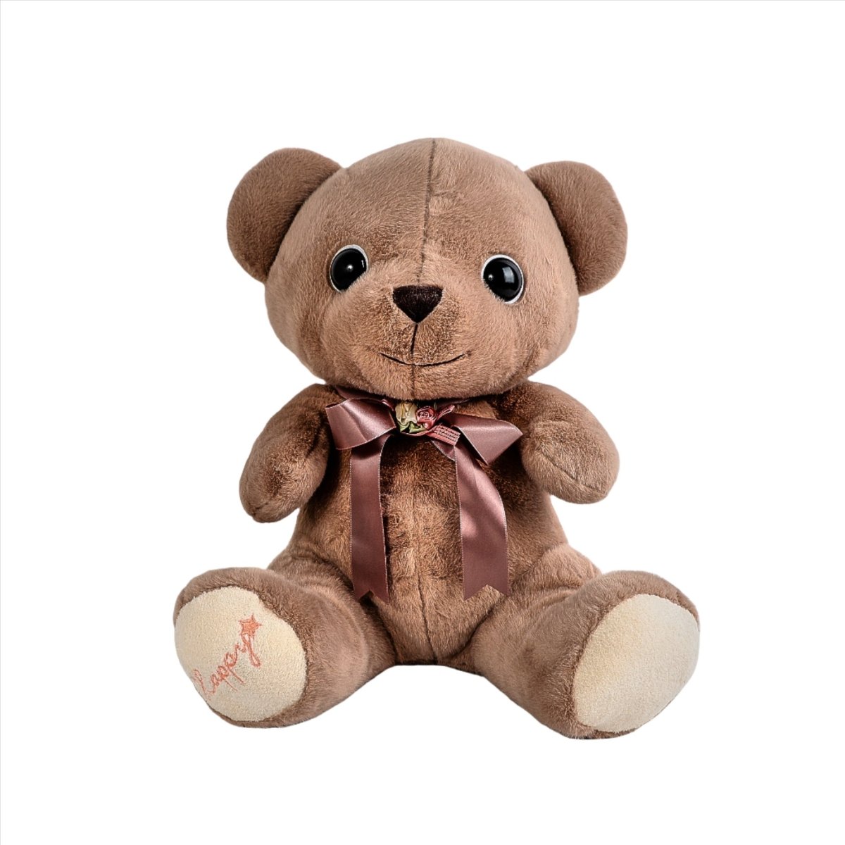 Soft brown teddy bear plush with mauve ribbon bow and stitched muzzle.