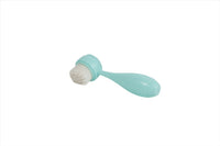 Teal silicone face cleansing brush with soft round bristles and short handle