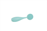 Mint face cleansing brush with round bristle head and tapered handle