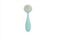 Mint face cleansing brush with round head of silicone dot bristles and curved handle