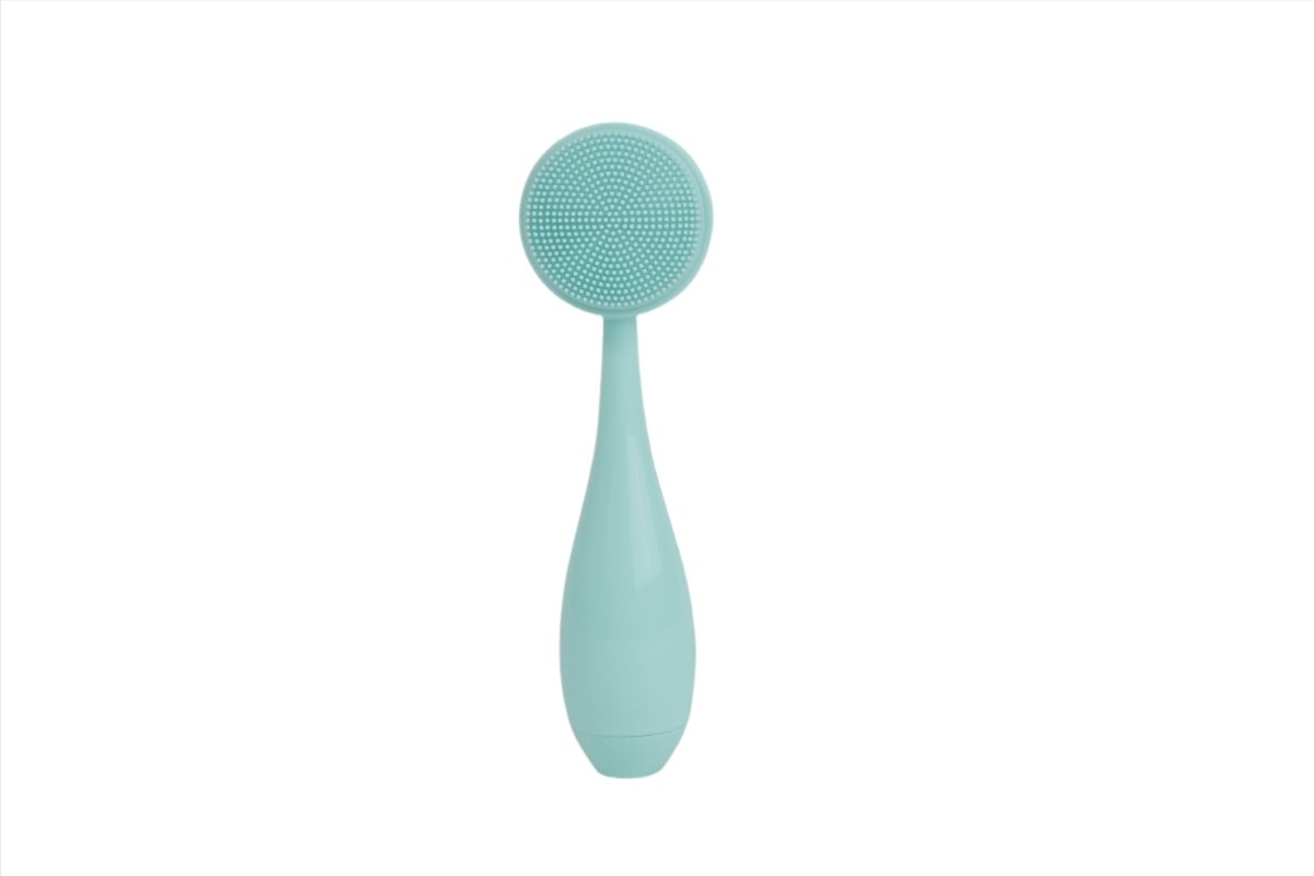 Mint face cleansing brush with circular silicone bristles and curved handle