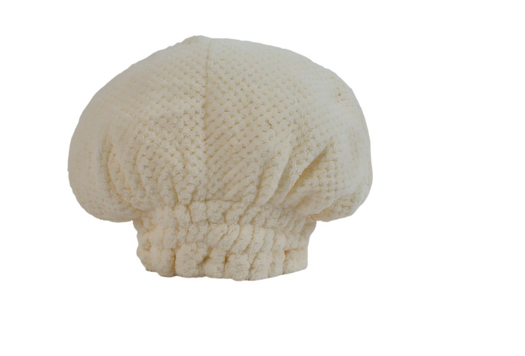 Cream soft hair towel shower cap, side view with gathered elastic at front