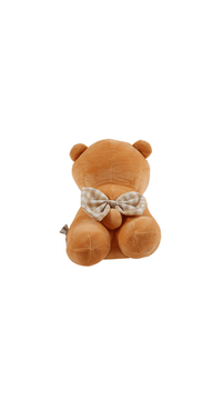 Brown plush bear pillow back view with bow tie at neck and stitched limbs