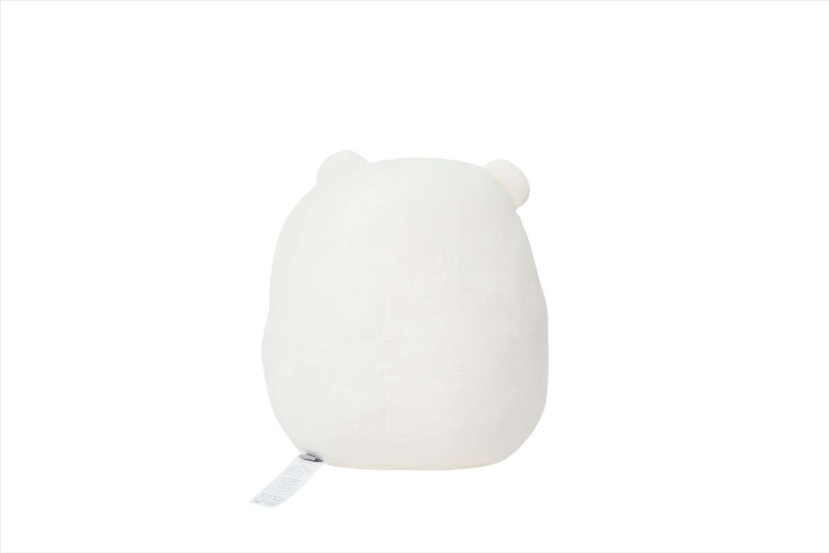 White plush polar bear toy, side view with small stubby feet and soft fur