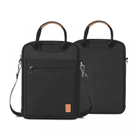 Pair of laptop bags with front zip pocket, top handles, and adjustable shoulder straps