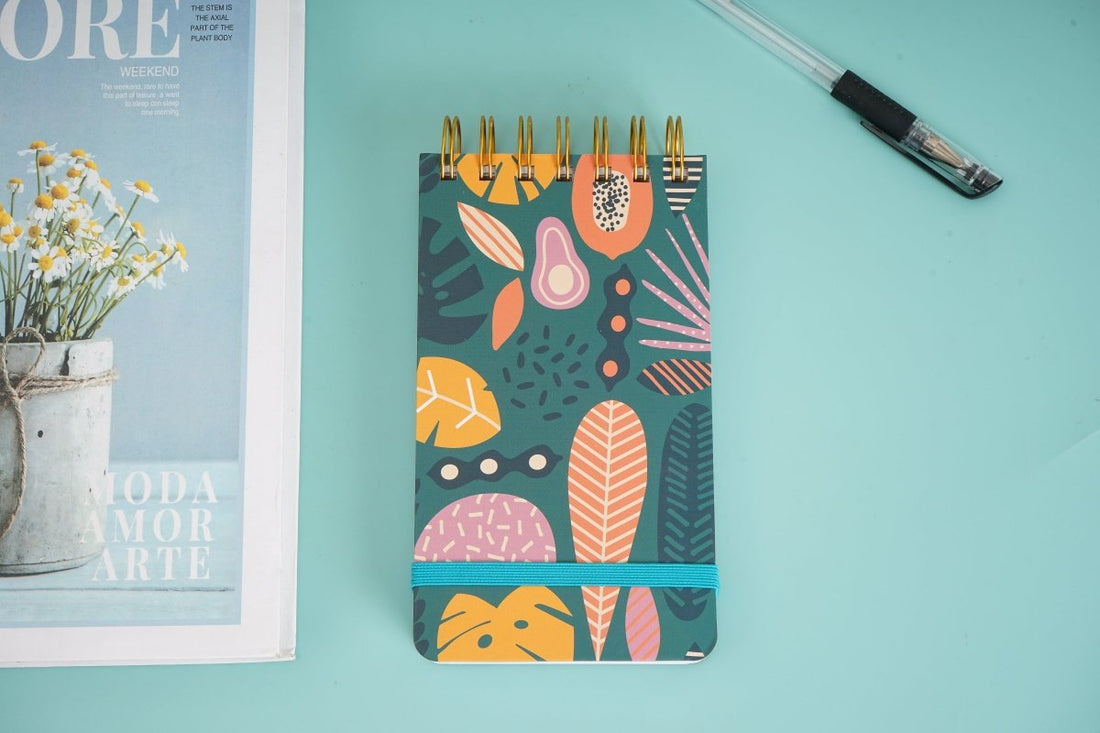 Kids spiral notebook with colorful leaf and plant pattern cover
