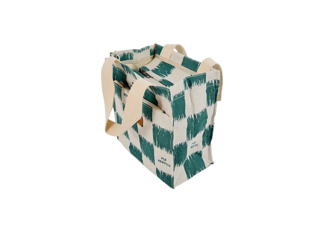 Canvas tote bag with green-and-white check pattern, open top, canvas handles.
