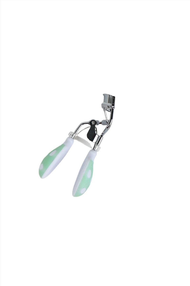 Dotted lash curler with mint-green pads and chrome clamp, open
