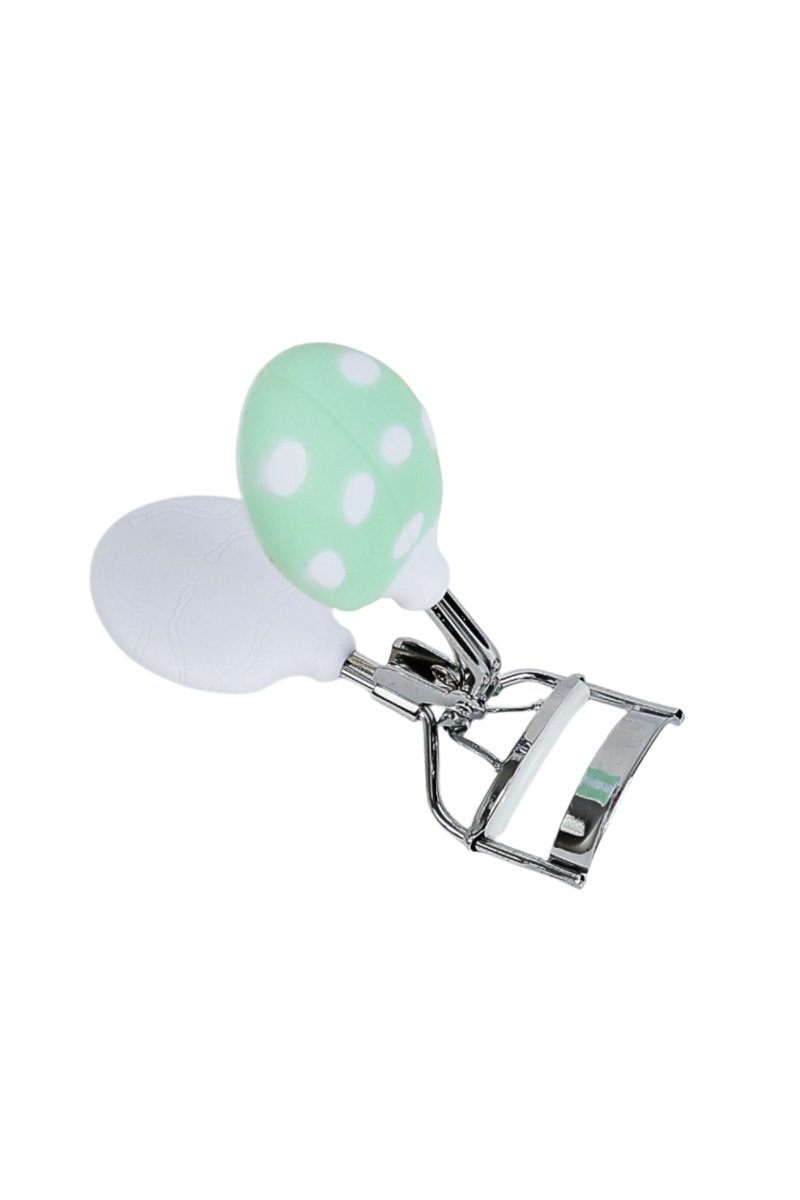 Dotted lash curler with mint-green dotted pad ends and chrome clamp