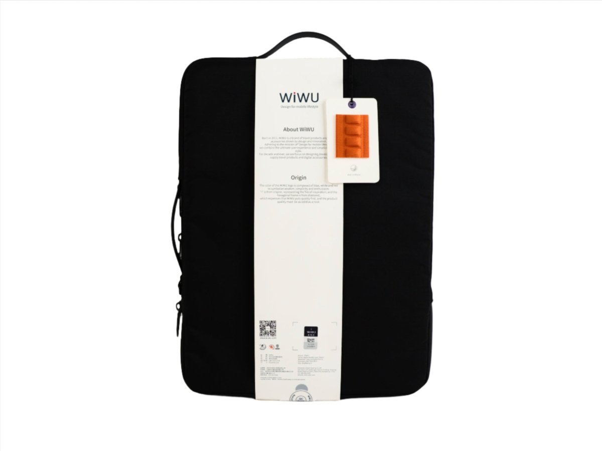 Black laptop sleeve with hanging retail tags and barcode card attached to front.