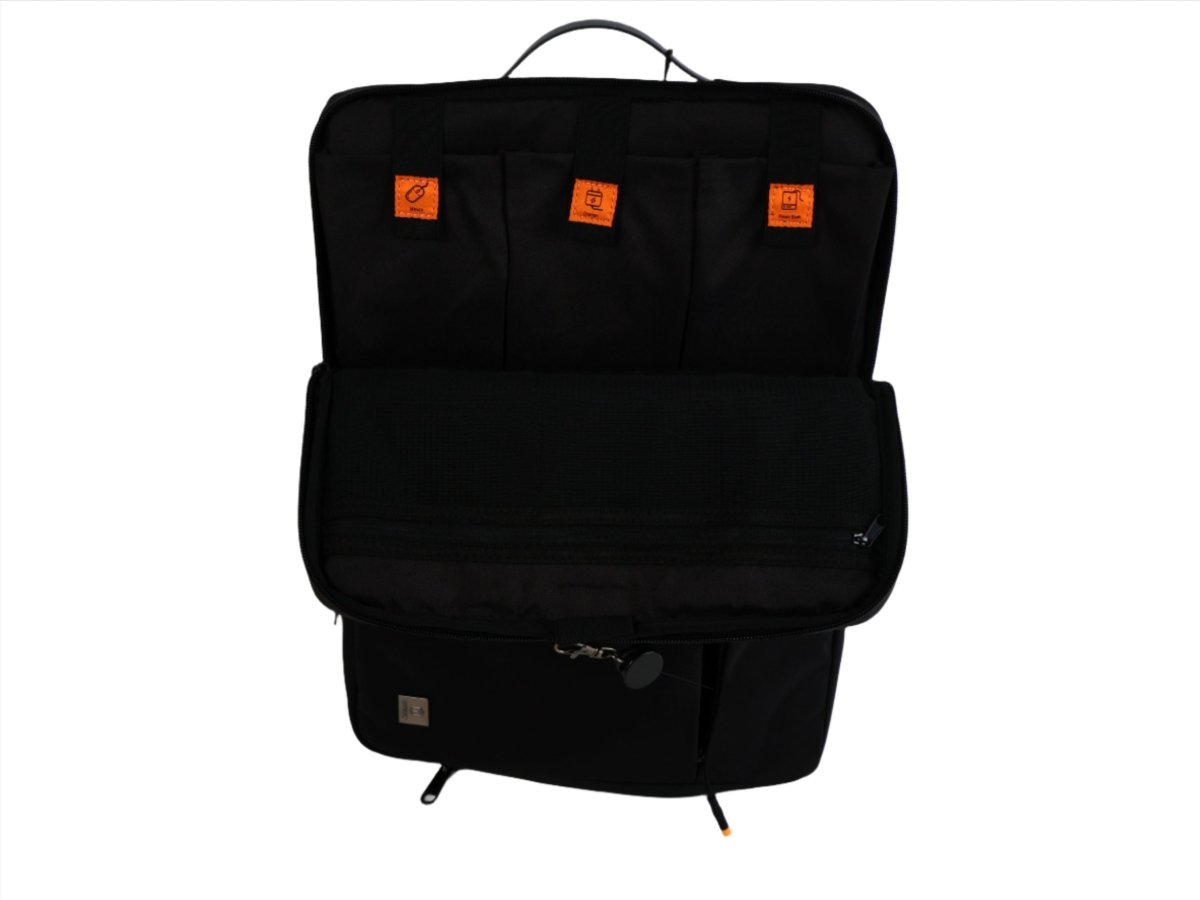 Laptop sleeve with multiple front compartments, top handle loop, and orange logo tabs.