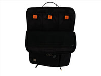 Laptop sleeve with multiple front compartments, top handle loop, and orange logo tabs.