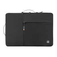 Black laptop sleeve with top handle, front zipper pocket, and metal accents.