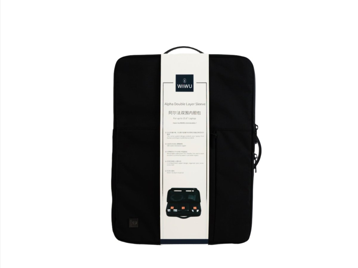 Black laptop sleeve with hanging product tag and instruction card inside sleeve.