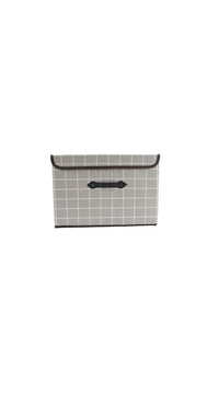 Fabric storage box with gray grid fabric and black label-style carry handle