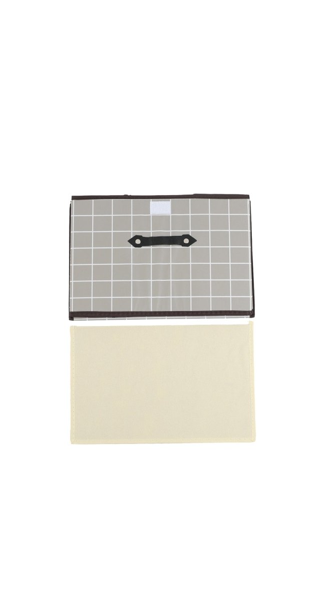 Fabric storage box with gray grid fabric, black handle, and cream bottom panel