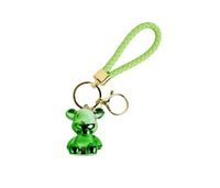 Green bear keychain with braided strap and gold clasp, twin key rings