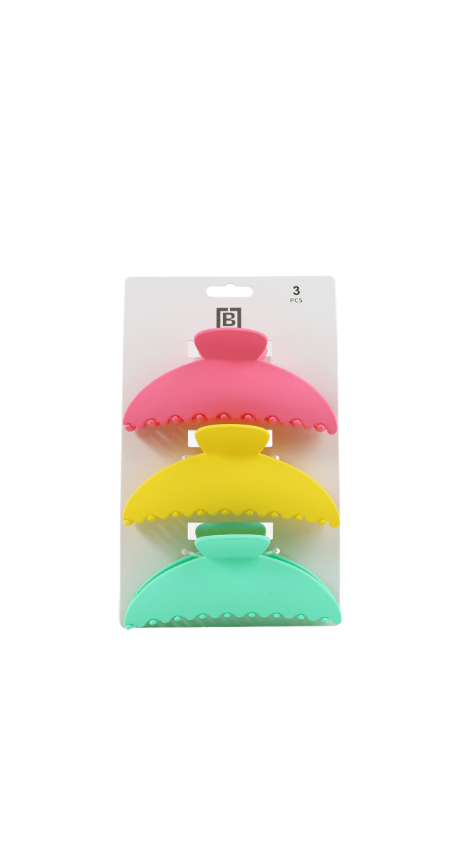 Colorful hair clip set of three with pink, yellow, mint green claw clips on card